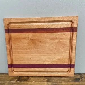 Square wooden cutting board with purple stripes